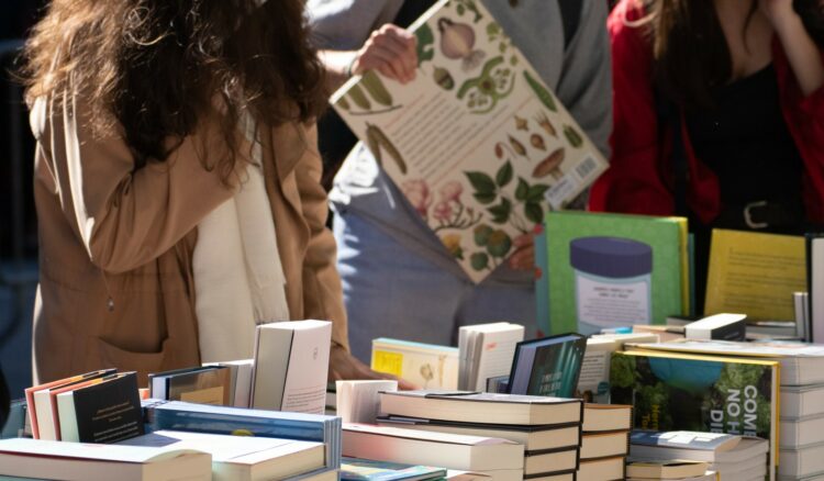 Photo of people buying used books