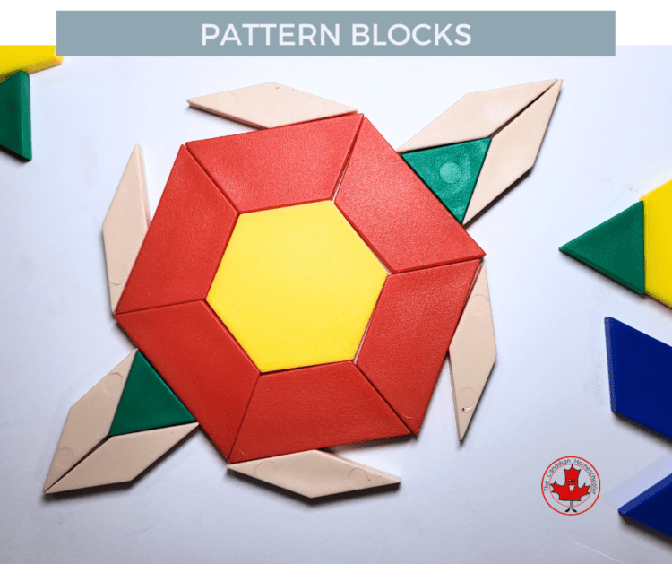 a symmetrical turtle type patterm made out of pattern blocks