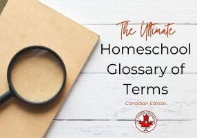 Image of a magnifying glass on a notebook sitting on white boards with the text "The Ultimate Homeschool Glossary of Terms"